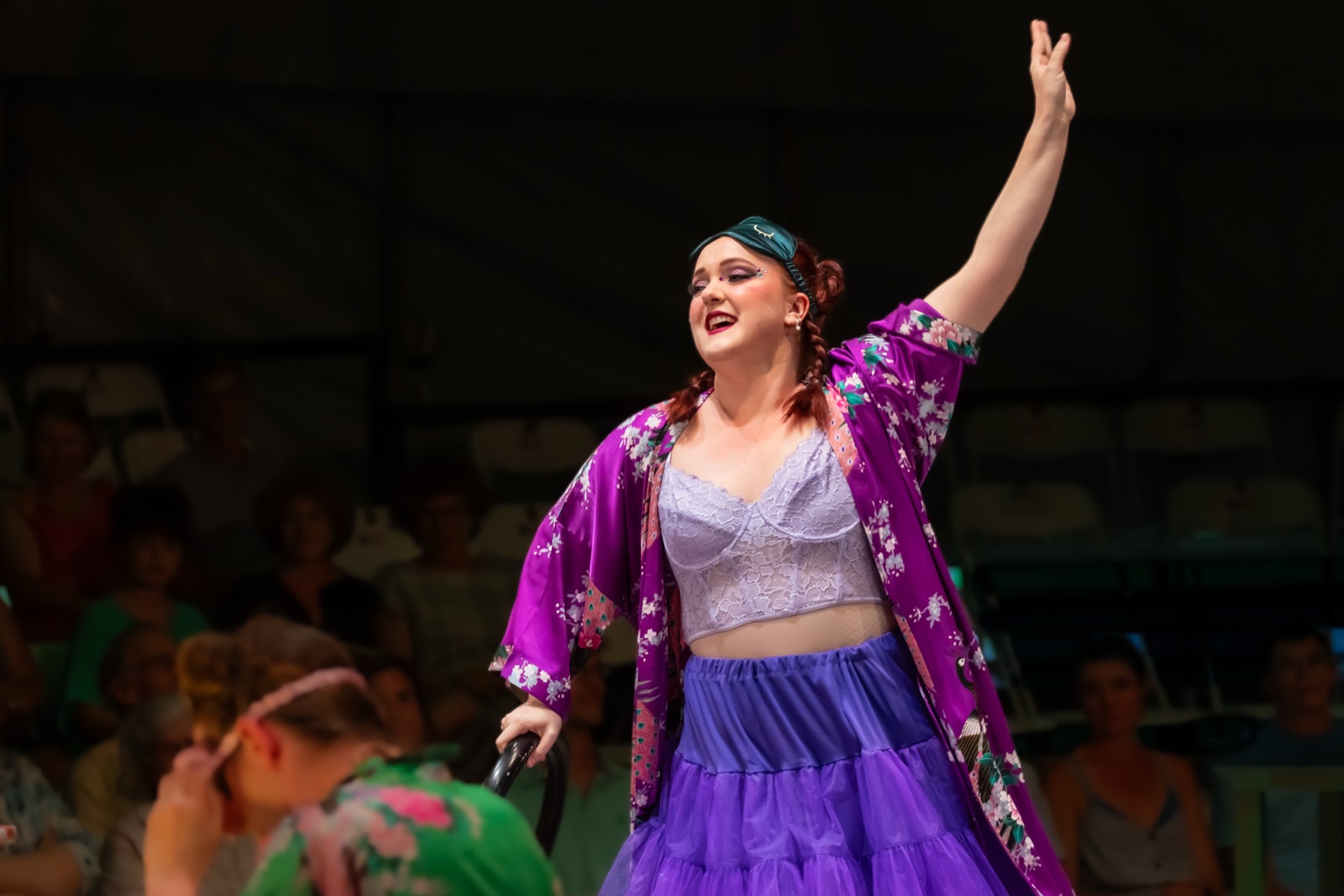 Veronica Richer in a purple costume in La Cenerentola