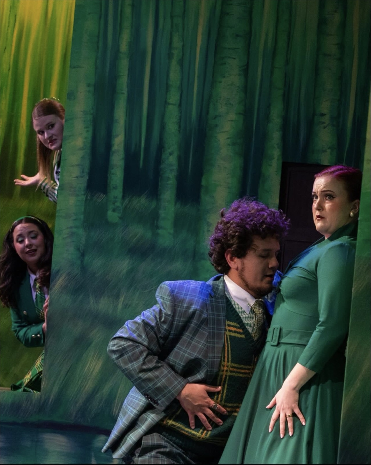 Veronica Richer as Alice Ford in a green dress in Falstaff